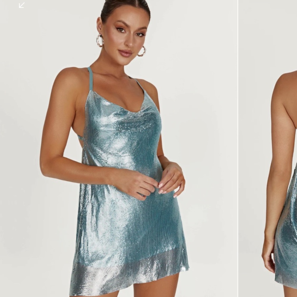 MESHKI- DOVE
Glomesh Cowl Mini Dress - Powder Blue. Size Small